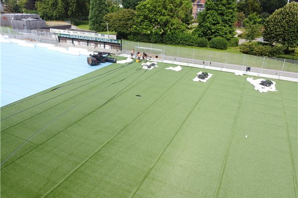 Aanleg kunstgras voetbalveld B + jeugdveld Loenhout SK - Sportinfrabouw NV